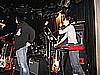 01. During sound check, Emi and Mike talk to Paul during a break..jpg