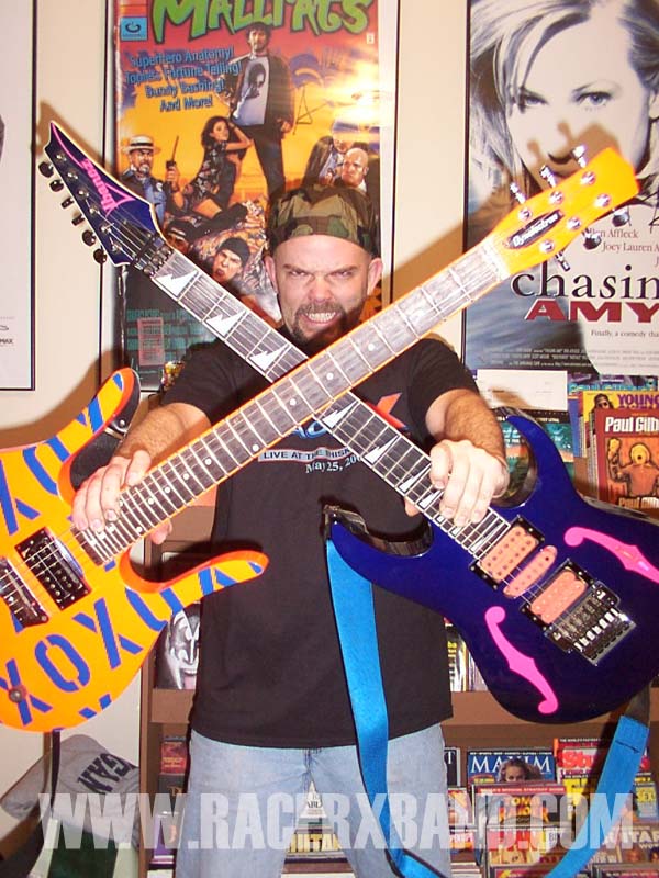 10. Sean Baker holding the Danelectro 36 fret X O guitar..jpg
